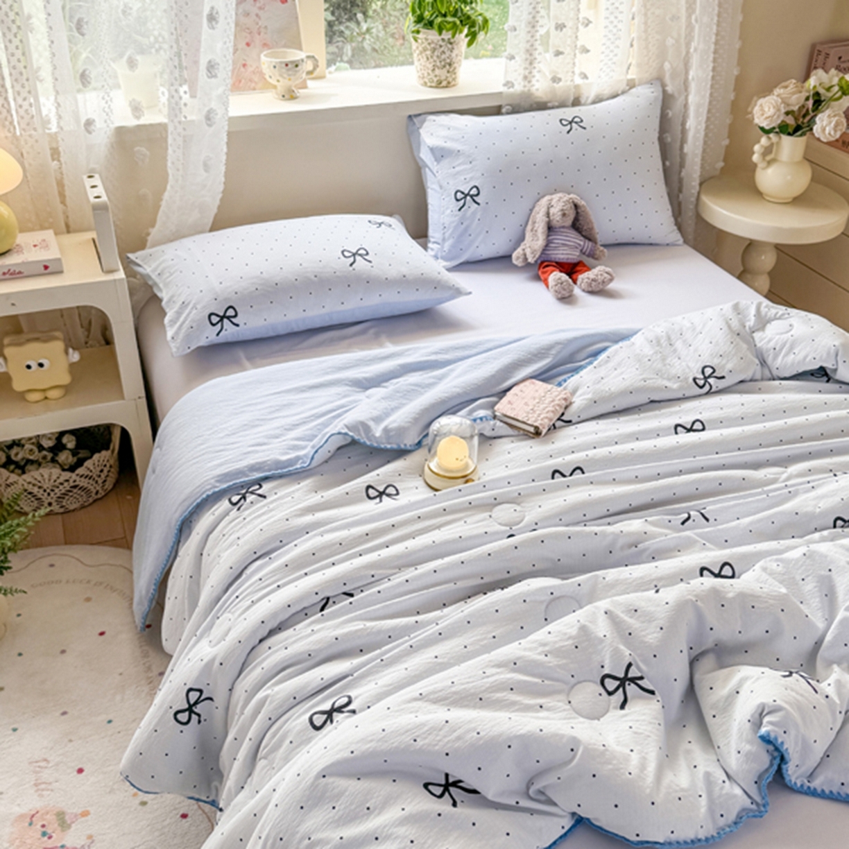 91家纺网 家纺一手货源 找家纺 雅蔓依家纺 2026春夏新款三角针贝壳边木棉云感双层纱棉花夏被夏凉被空调被 海盐蝴蝶结