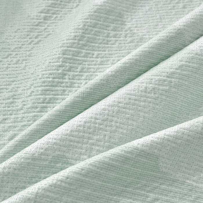 91家纺网 家纺一手货源 找家纺 诺梵家纺 2026新款凉豆豆PE高分子凉感花边床裙凉席三件套 见山-绿