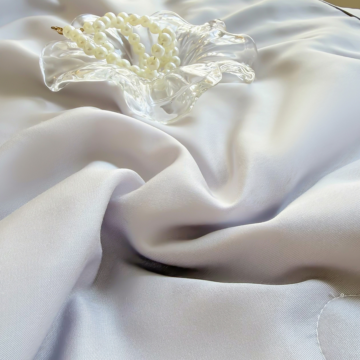 91家纺网 家纺一手货源 找家纺 三俏家纺 2026新款夏被100%莱赛尔天丝纯色床盖款夏被四件套60支天丝夏凉被 灰粉色