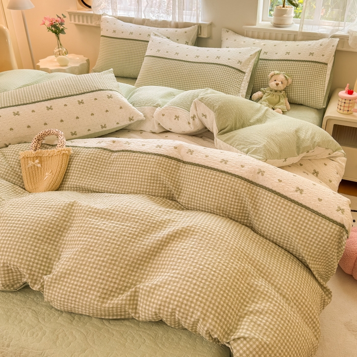 91家纺网 家纺一手货源 找家纺 凤杰家纺 2026新款云感双层纱床盖四件套 浅绿格纹