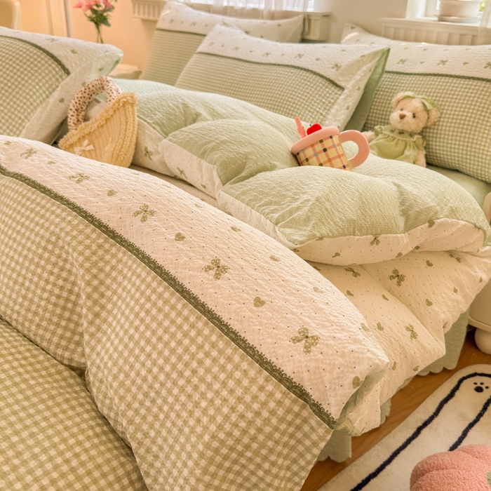 91家纺网 家纺一手货源 找家纺 凤杰家纺 2026新款云感双层纱床盖四件套 浅绿格纹