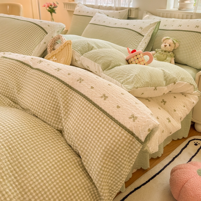 91家纺网 家纺一手货源 找家纺 凤杰家纺 2026新款云感双层纱床盖四件套 浅绿格纹