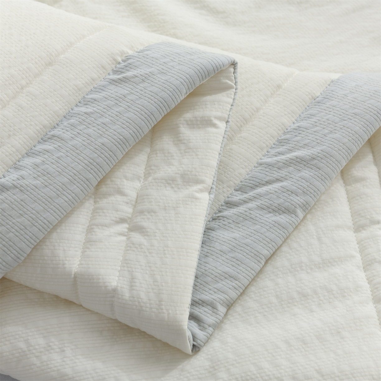 91家纺网 家纺一手货源 找家纺 恋绒家纺 2026春夏新款泡芙纱双层纱泡泡提花皱皱纱夏被夏凉被空调被 米白色