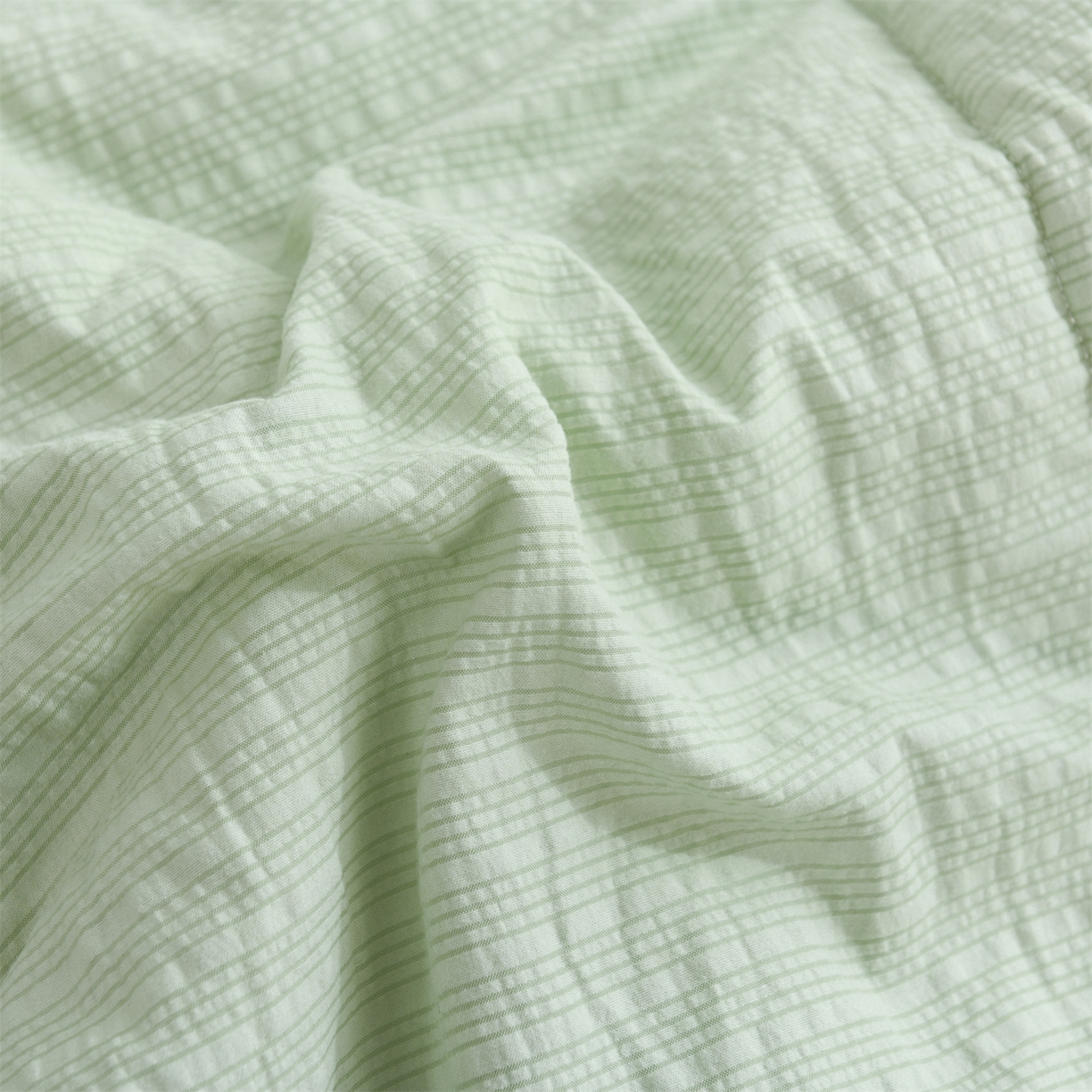 91家纺网 家纺一手货源 找家纺 恋绒家纺 2026春夏新款泡芙纱双层纱泡泡提花皱皱纱夏被夏凉被空调被 浅绿色