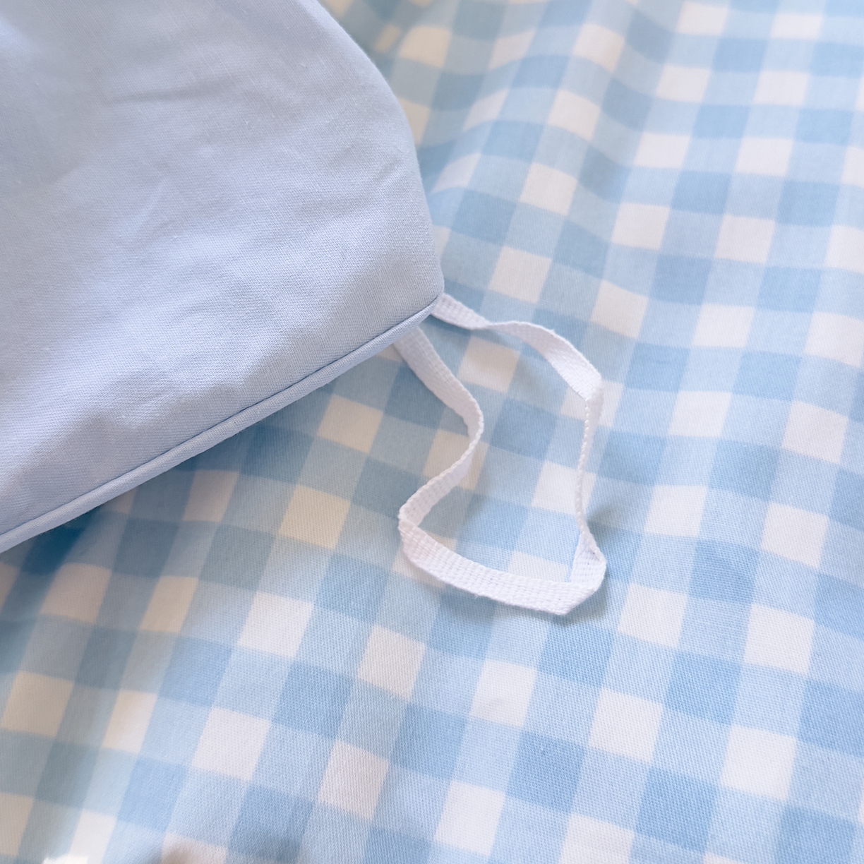 91家纺网 家纺一手货源 找家纺 DoDo 兜兜 2026年全棉纯棉ins风小清新四件套 晴空奶盖-枕套1对格子