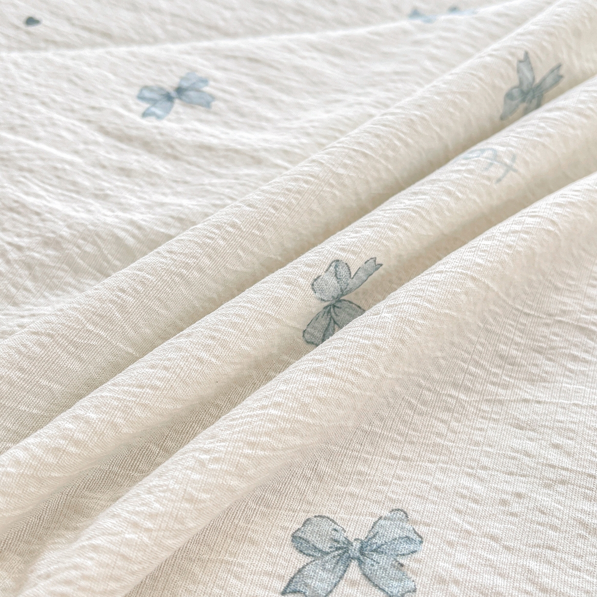 91家纺网 家纺一手货源 找家纺 米萝家居 2026新款泡泡棉夏被新疆棉花空调被夏凉被 蝴蝶结