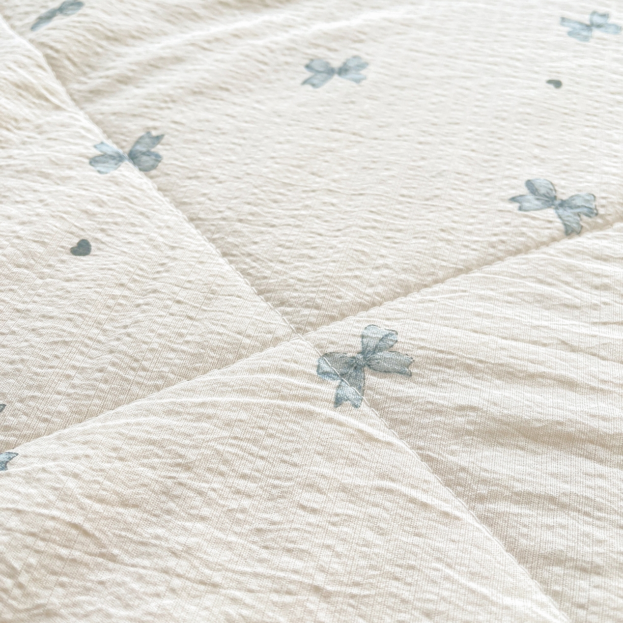 91家纺网 家纺一手货源 找家纺 米萝家居 2026新款泡泡棉夏被新疆棉花空调被夏凉被 蝴蝶结