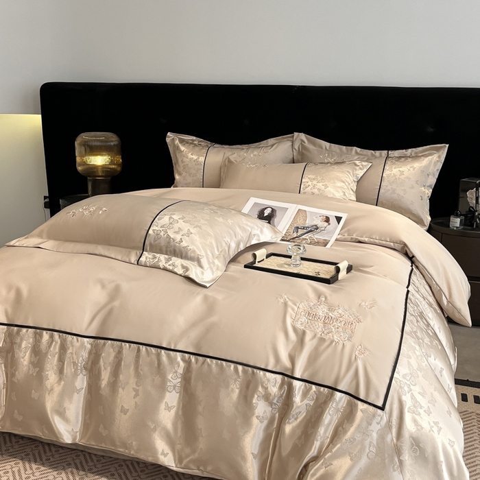 91家纺网 家纺一手货源 找家纺 （总）金牛座家纺 2026新款金牛座细斜纹贡缎亮丝提花大拼角刺绣床盖四件套-缇娜系列