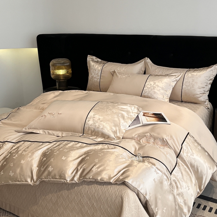 91家纺网 家纺一手货源 找家纺 （总）金牛座家纺 2026新款金牛座细斜纹贡缎亮丝提花大拼角刺绣床盖四件套-缇娜系列