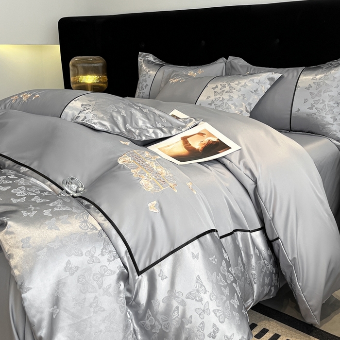 91家纺网 家纺一手货源 找家纺 （总）金牛座家纺 2026新款金牛座细斜纹贡缎亮丝提花大拼角刺绣床盖四件套-缇娜系列