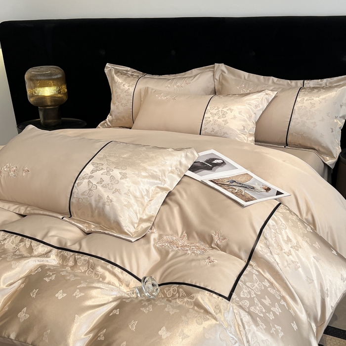 91家纺网 家纺一手货源 找家纺 （总）金牛座家纺 2026新款金牛座细斜纹贡缎亮丝提花大拼角刺绣床盖四件套-缇娜系列