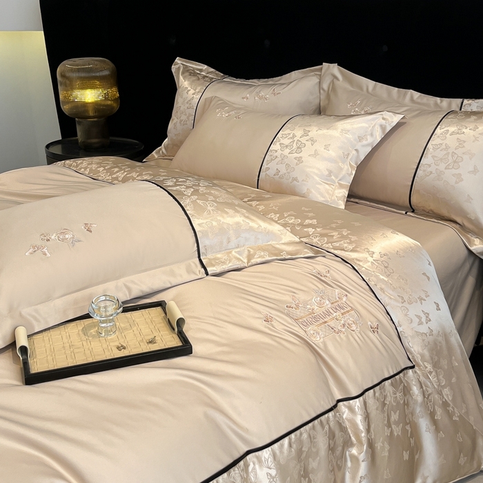 91家纺网 家纺一手货源 找家纺 金牛座家纺 2026新款金牛座细斜纹贡缎亮丝提花大拼角刺绣床盖四件套-缇娜系列 缇娜-香槟