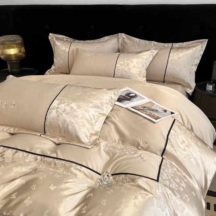 91家纺网 家纺一手货源 找家纺 金牛座家纺 2026新款金牛座细斜纹贡缎亮丝提花大拼角刺绣床盖四件套-缇娜系列 缇娜-香槟