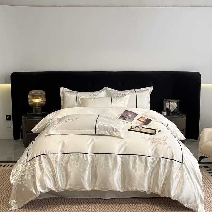 91家纺网 家纺一手货源 找家纺 金牛座家纺 2026新款金牛座细斜纹贡缎亮丝提花大拼角刺绣床盖四件套-缇娜系列 缇娜-奶白