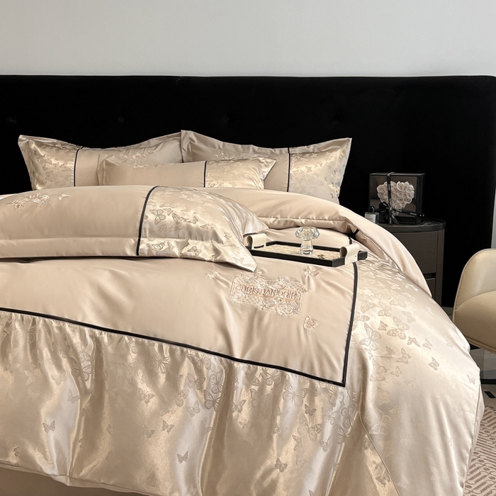 91家纺网 家纺一手货源 找家纺 金牛座家纺 2026新款金牛座细斜纹贡缎亮丝提花大拼角刺绣床盖四件套-缇娜系列 缇娜-香槟