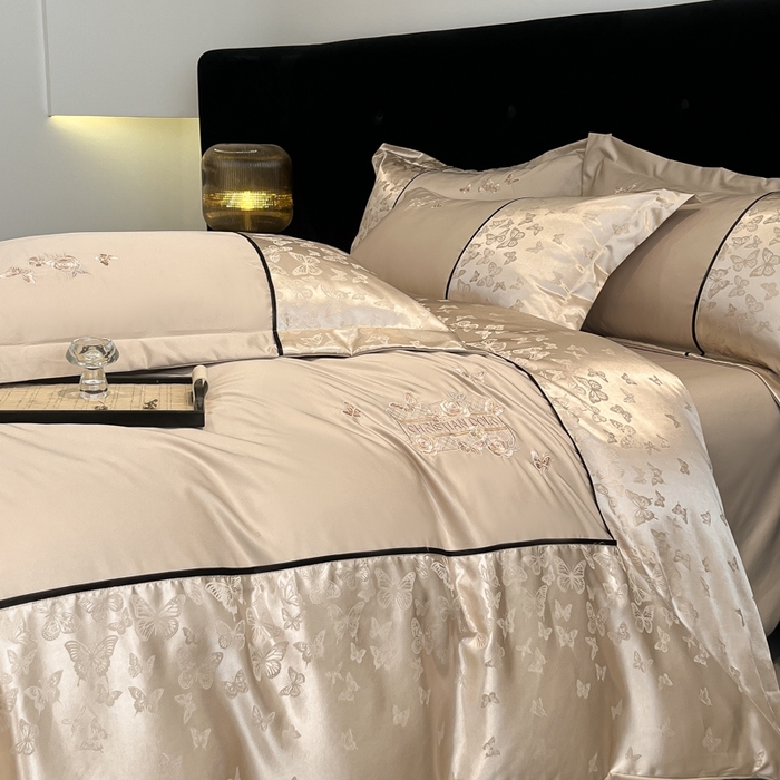 91家纺网 家纺一手货源 找家纺 金牛座家纺 2026新款金牛座细斜纹贡缎亮丝提花大拼角刺绣床盖四件套-缇娜系列 缇娜-香槟