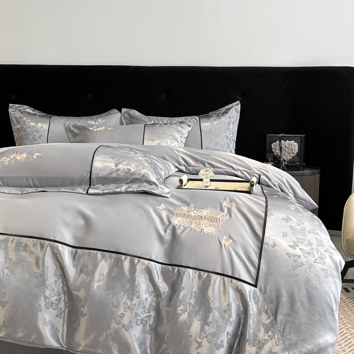 91家纺网 家纺一手货源 找家纺 金牛座家纺 2026新款金牛座细斜纹贡缎亮丝提花大拼角刺绣床盖四件套-缇娜系列 缇娜-灰