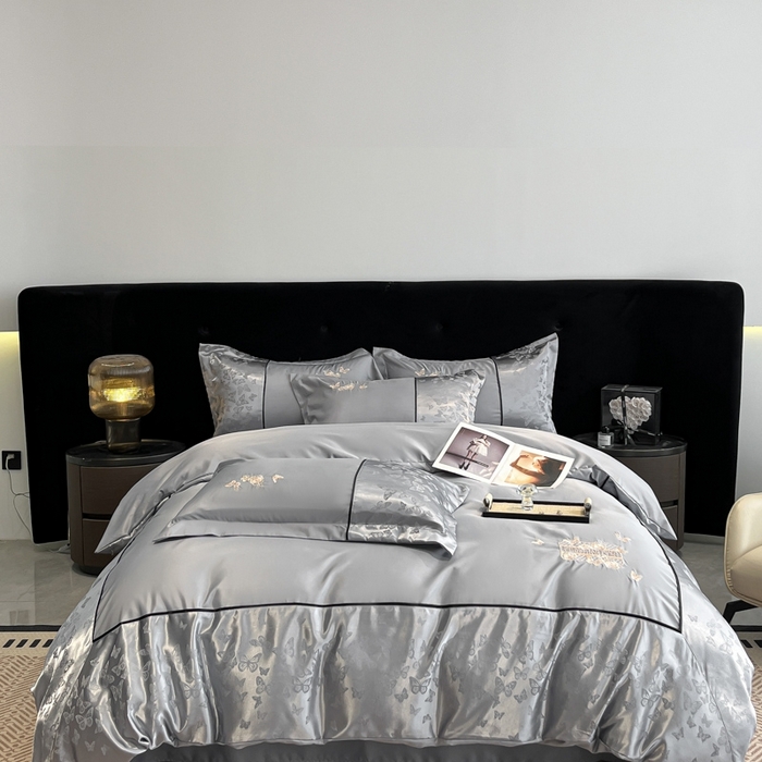 91家纺网 家纺一手货源 找家纺 金牛座家纺 2026新款金牛座细斜纹贡缎亮丝提花大拼角刺绣床盖四件套-缇娜系列 缇娜-灰