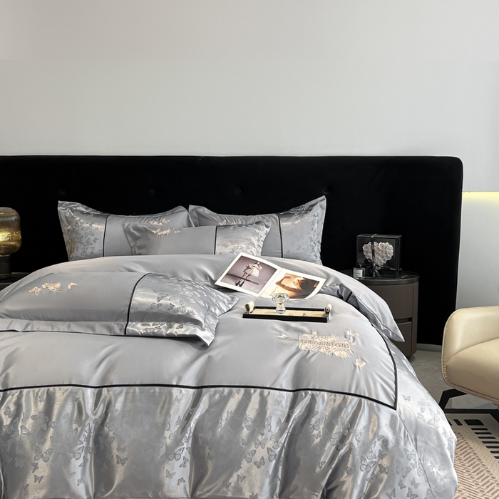 91家纺网 家纺一手货源 找家纺 金牛座家纺 2026新款金牛座细斜纹贡缎亮丝提花大拼角刺绣床盖四件套-缇娜系列 缇娜-灰