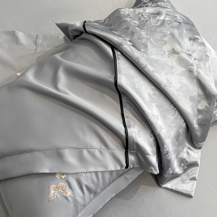 91家纺网 家纺一手货源 找家纺 金牛座家纺 2026新款金牛座细斜纹贡缎亮丝提花大拼角刺绣床盖四件套-缇娜系列 缇娜-灰