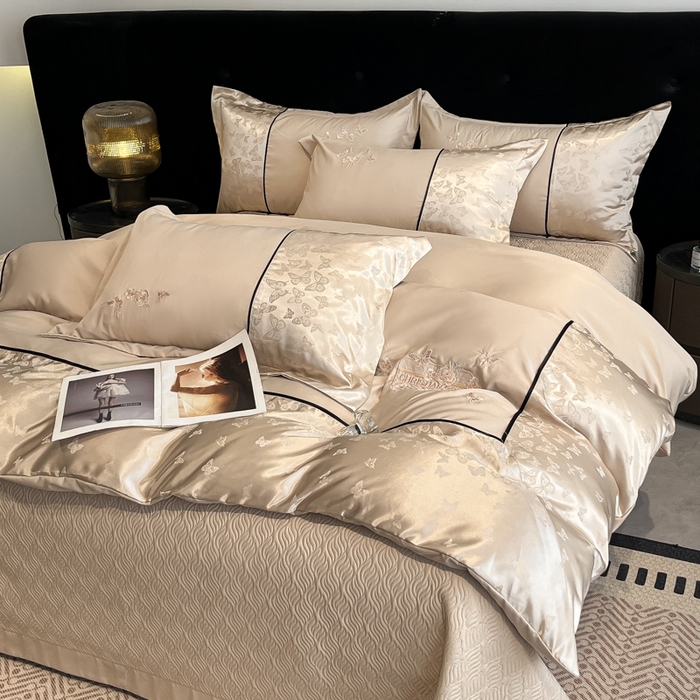 91家纺网 家纺一手货源 找家纺 （总）金牛座家纺 2026新款金牛座细斜纹贡缎亮丝提花大拼角刺绣床盖四件套-缇娜系列