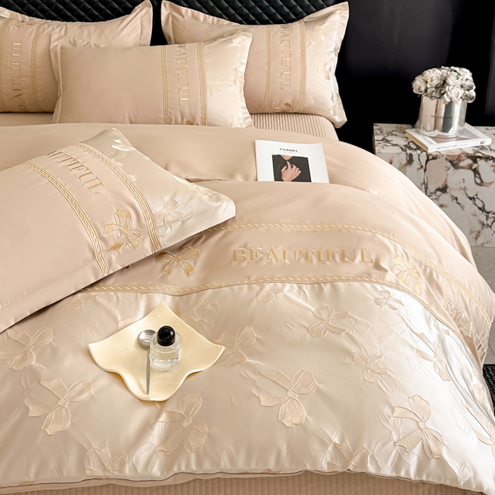 91家纺网 家纺一手货源 找家纺 首尔家纺 2026新款金丝立体浮雕提花水洗真丝天丝床盖款四件套 蝴蝶结-粉玉