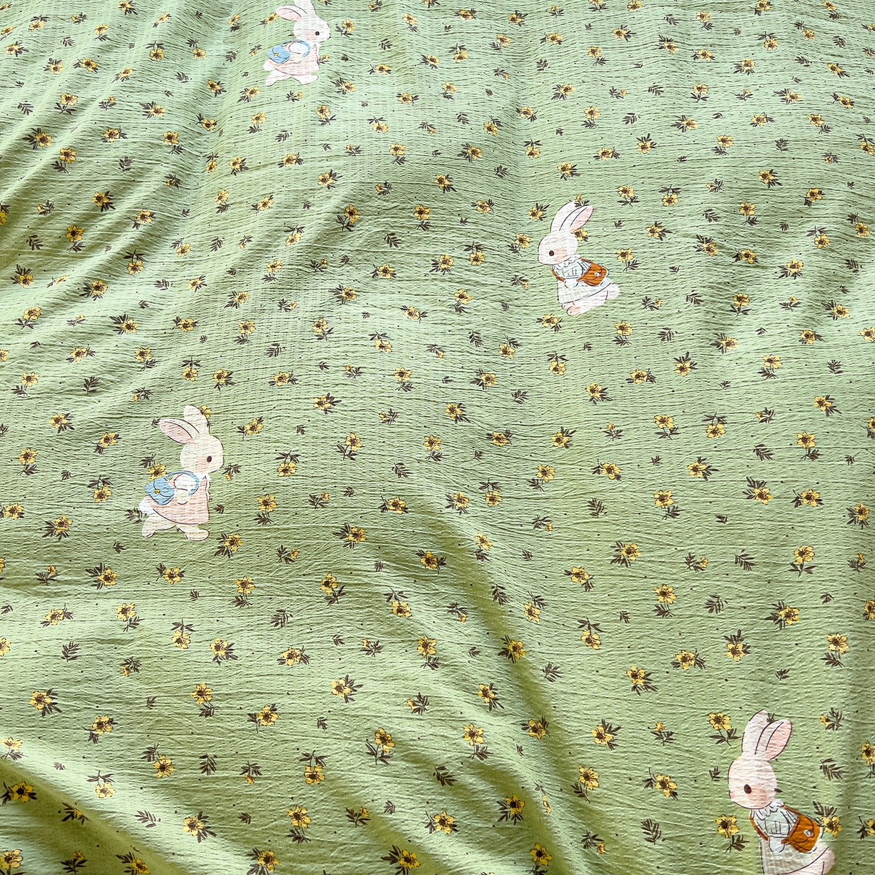 91家纺网 家纺一手货源 找家纺 找底底家纺 2026新款泡泡棉小清新双层纱床裙款四件套 青橘兔