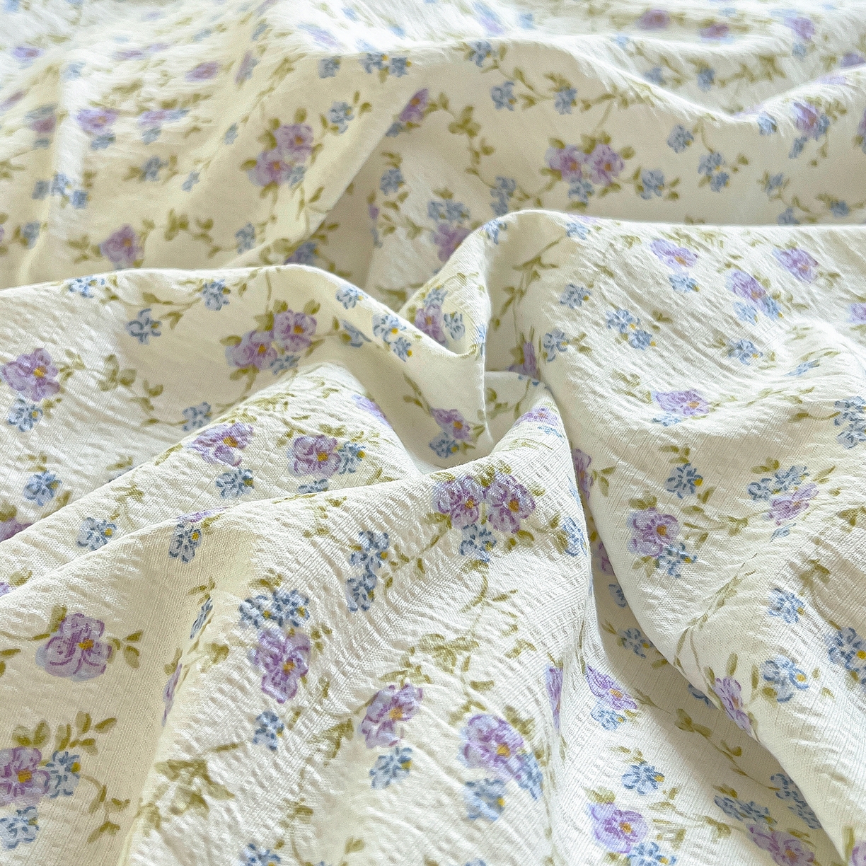 91家纺网 家纺一手货源 找家纺 找底底家纺 2026新款泡泡棉小清新双层纱床裙款四件套 紫蕊奶芙