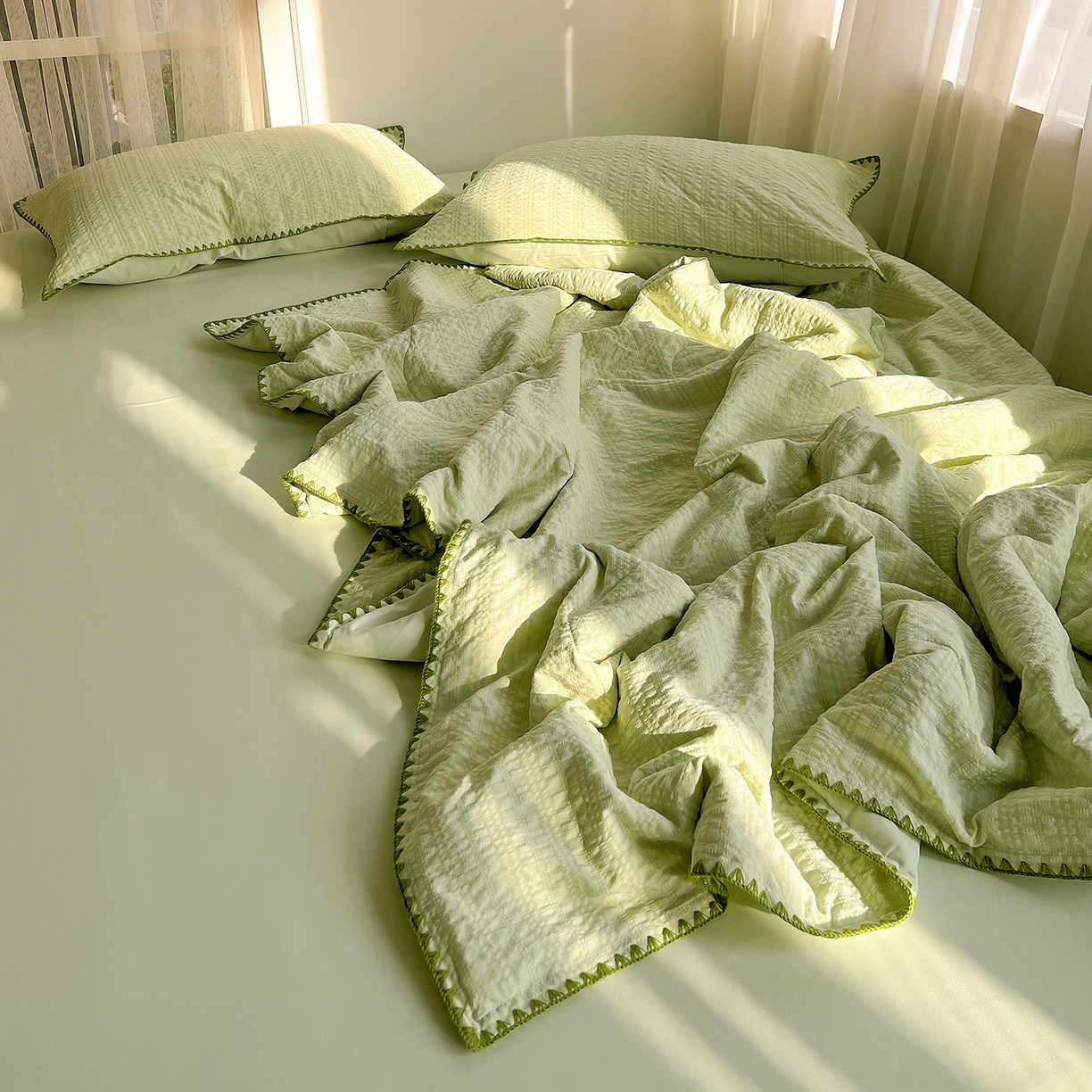91家纺网 家纺一手货源 找家纺 仟网汇 2026新款贝壳边泡泡纱三角针夏被四件套--纯色系列 抹茶绿