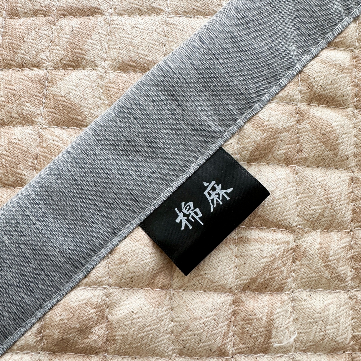 91家纺网 家纺一手货源 找家纺 凌云家纺 2026新款复古棉麻老粗布夹棉枕巾 宝相花