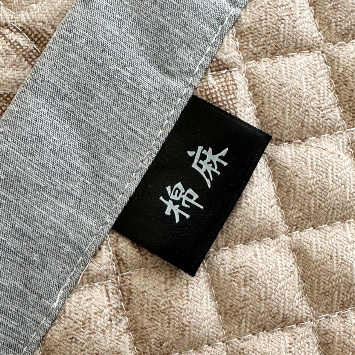 91家纺网 家纺一手货源 找家纺 凌云家纺 2026新款复古棉麻老粗布夹棉枕巾 花蝶