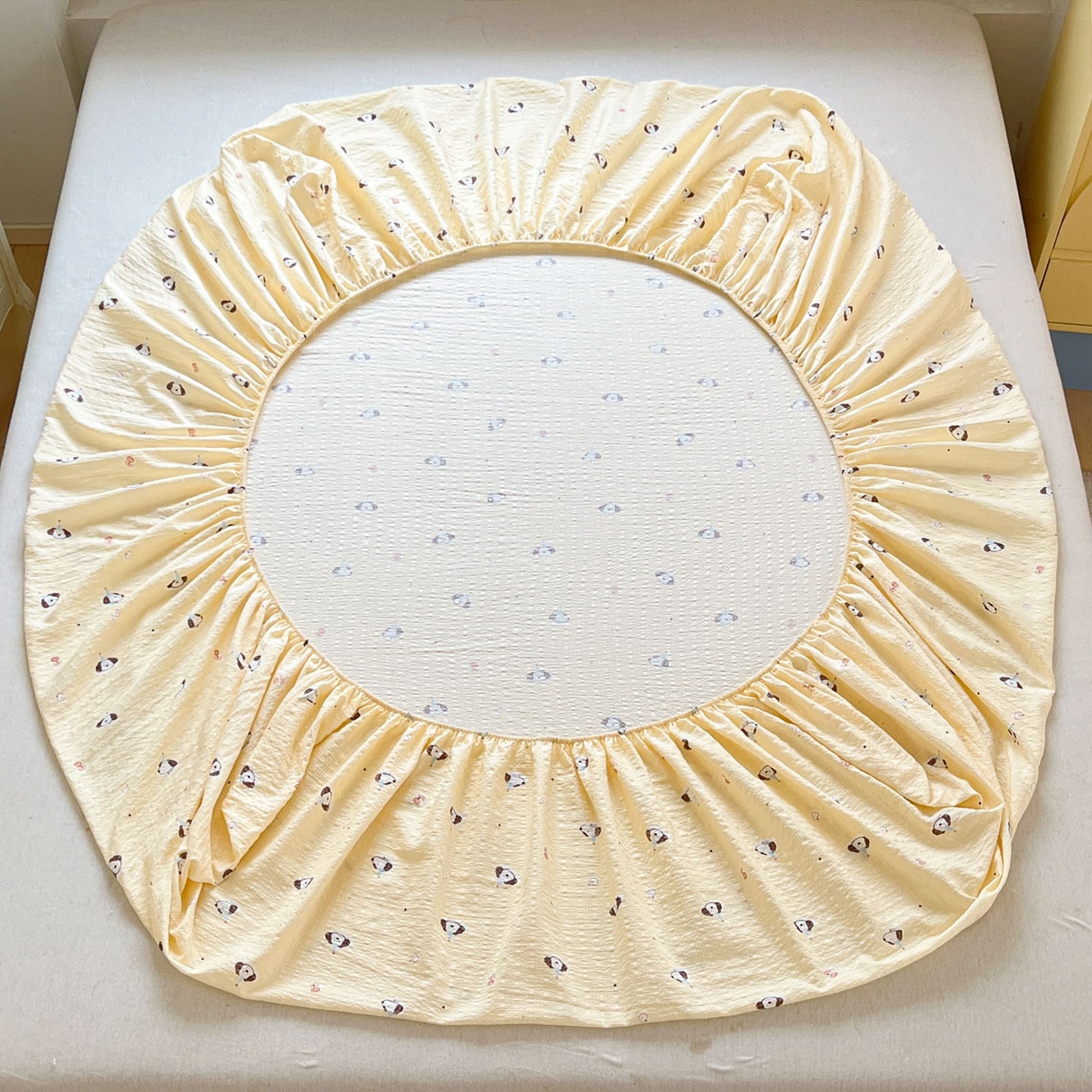 91家纺网 家纺一手货源 找家纺 蓝极人 2026新款泡泡纱印花床笠 CL生日狗