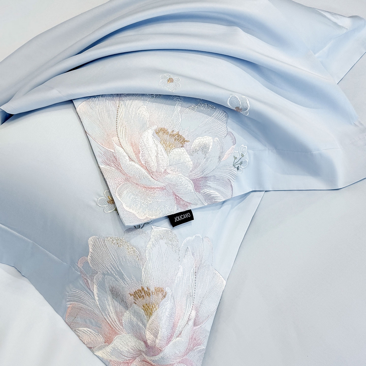 91家纺网 家纺一手货源 找家纺 2026新品高档轻奢风100支贡缎长绒棉纯棉四件套全棉重工刺绣被套床单床笠新品四季款床上用品 花影-慕蓝