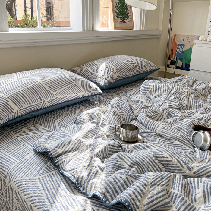 91家纺网 家纺一手货源 找家纺 欧尚 2026新款泡芙纱三角针床盖夏被四件套 浅川纹