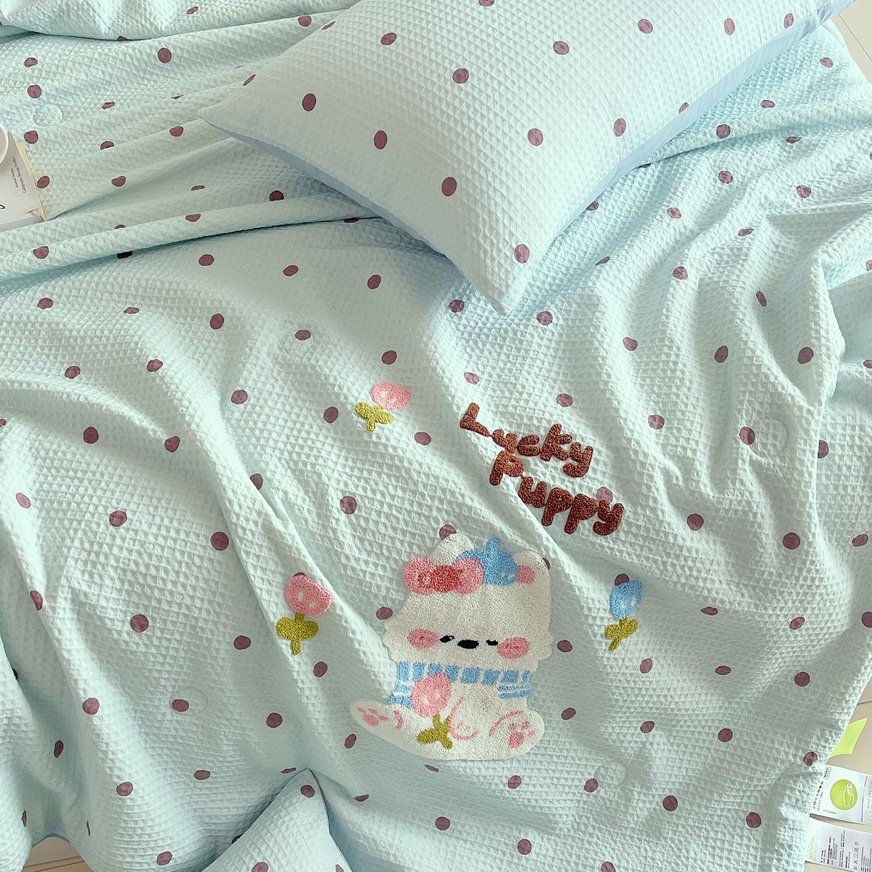 91家纺网 家纺一手货源 找家纺 莱宁被业 2026新款A类全棉华夫格提花毛巾绣卡通大豆夏被 萌宠西高地