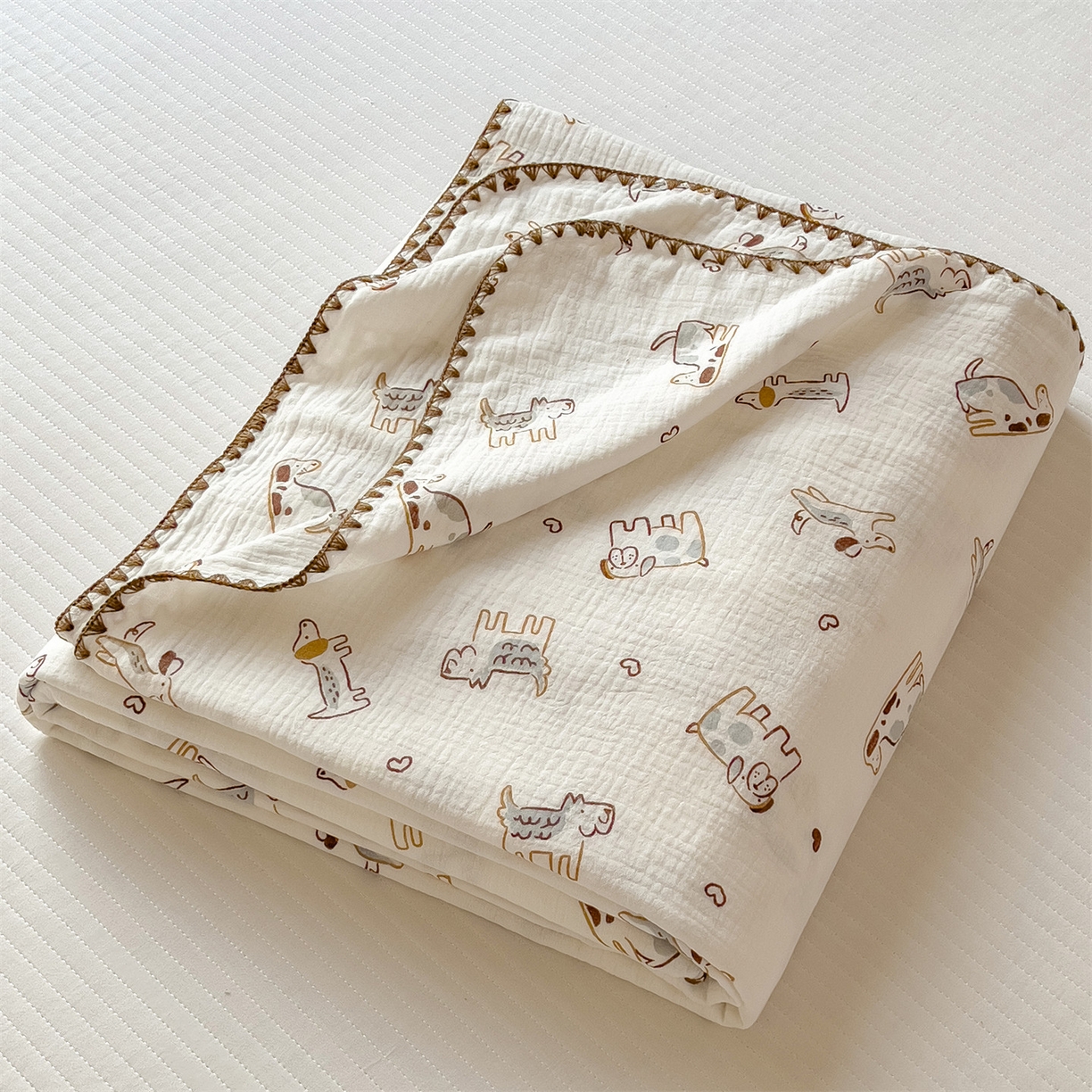 91家纺网 家纺一手货源 找家纺 布凡家居 2026新款A类贝壳边全棉双层纱布毯夏被毯盖毯双层纱浴巾毯 皱皱纱-调皮狗