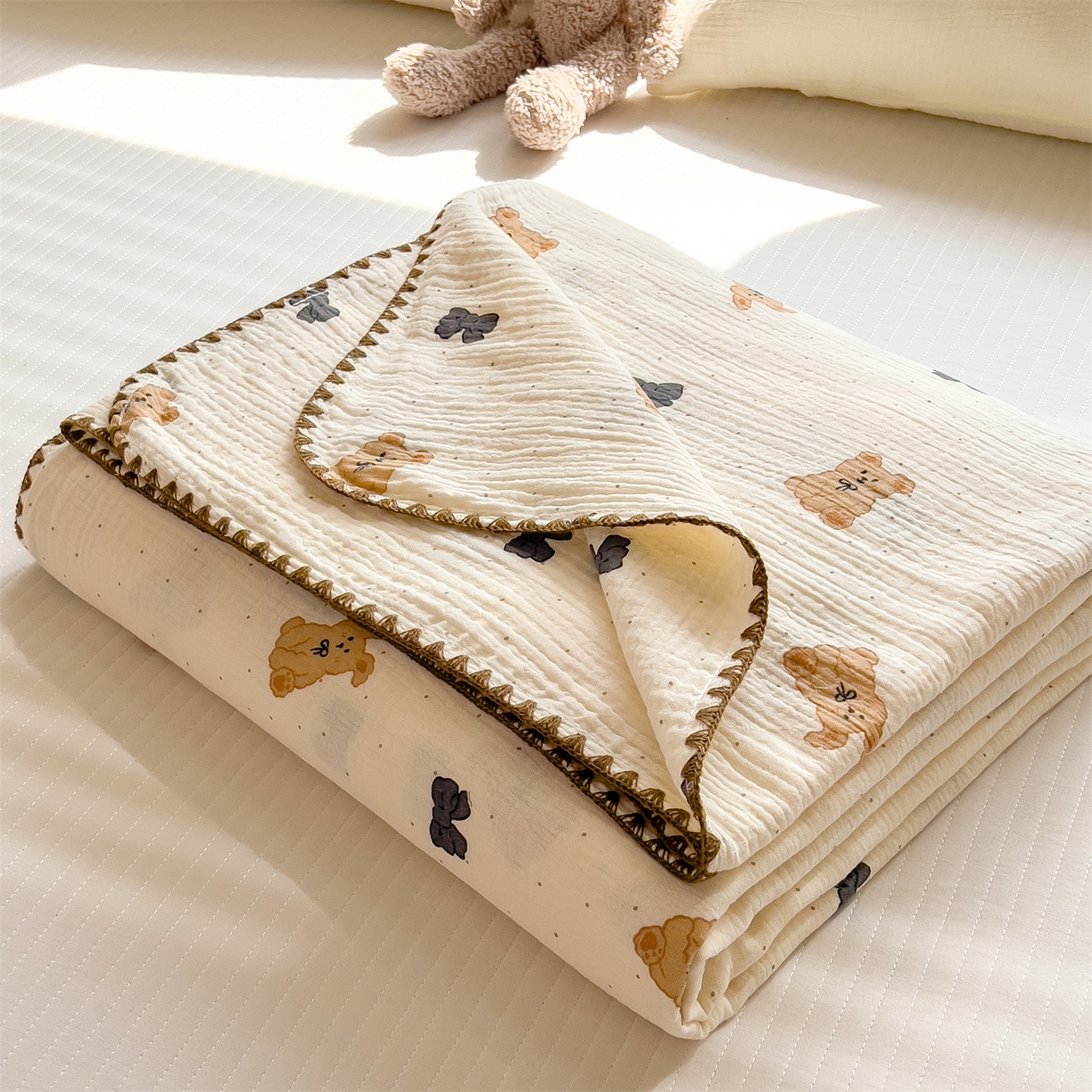 91家纺网 家纺一手货源 找家纺 布凡家居 2026新款A类贝壳边全棉双层纱布毯夏被毯盖毯双层纱浴巾毯 皱皱纱-小玩偶