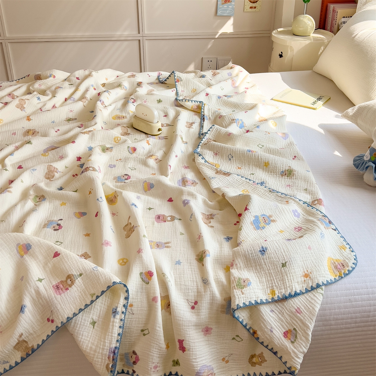 91家纺网 家纺一手货源 找家纺 布凡家居 2026新款A类贝壳边全棉双层纱布毯夏被毯盖毯双层纱浴巾毯 皱皱纱-音乐小狗