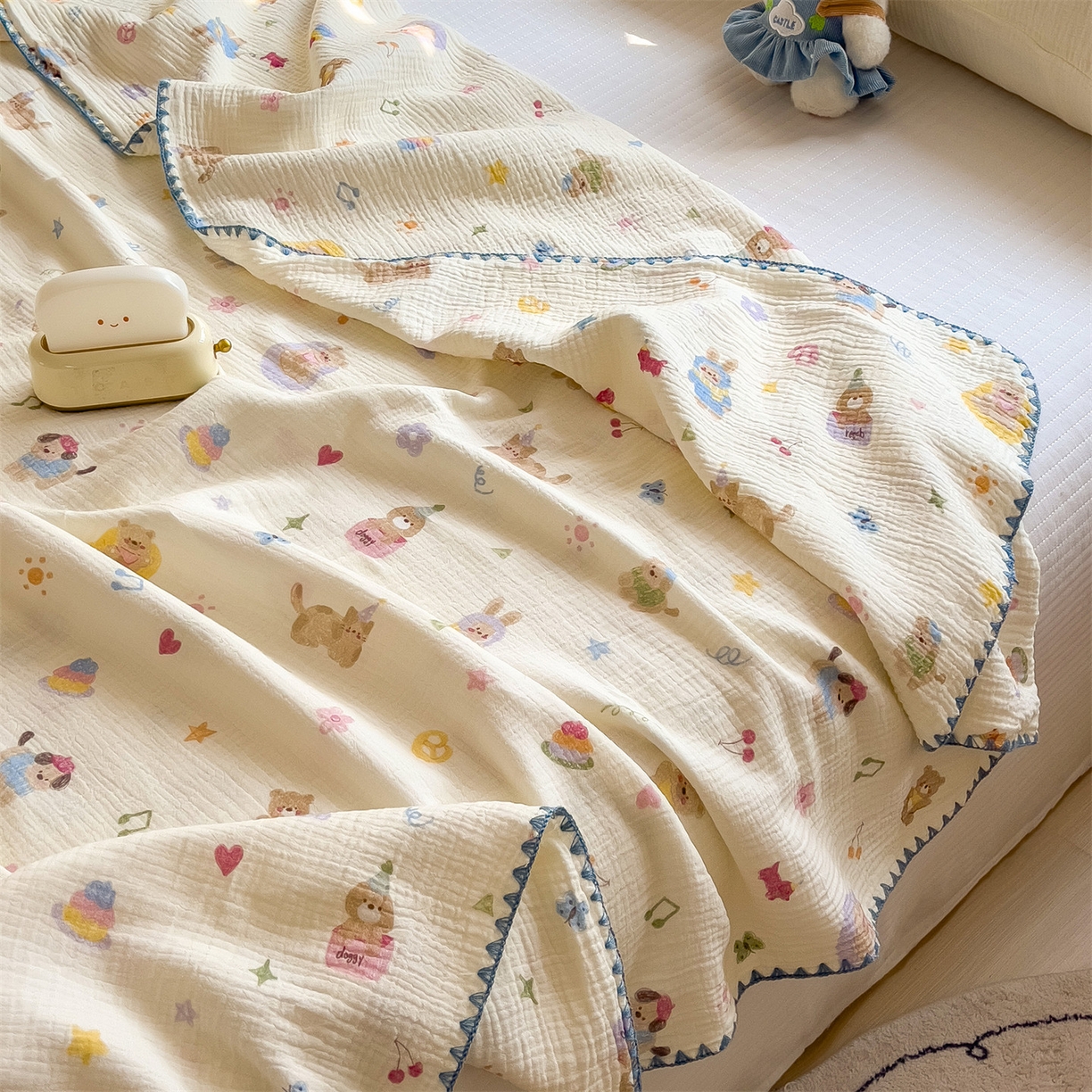 91家纺网 家纺一手货源 找家纺 布凡家居 2026新款A类贝壳边全棉双层纱布毯夏被毯盖毯双层纱浴巾毯 皱皱纱-音乐小狗