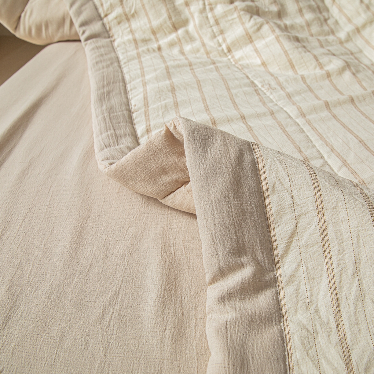 91家纺网 家纺一手货源 找家纺 江暮云家纺 2026新款A类亚麻印花新疆棉花被 奶棕蝴蝶结