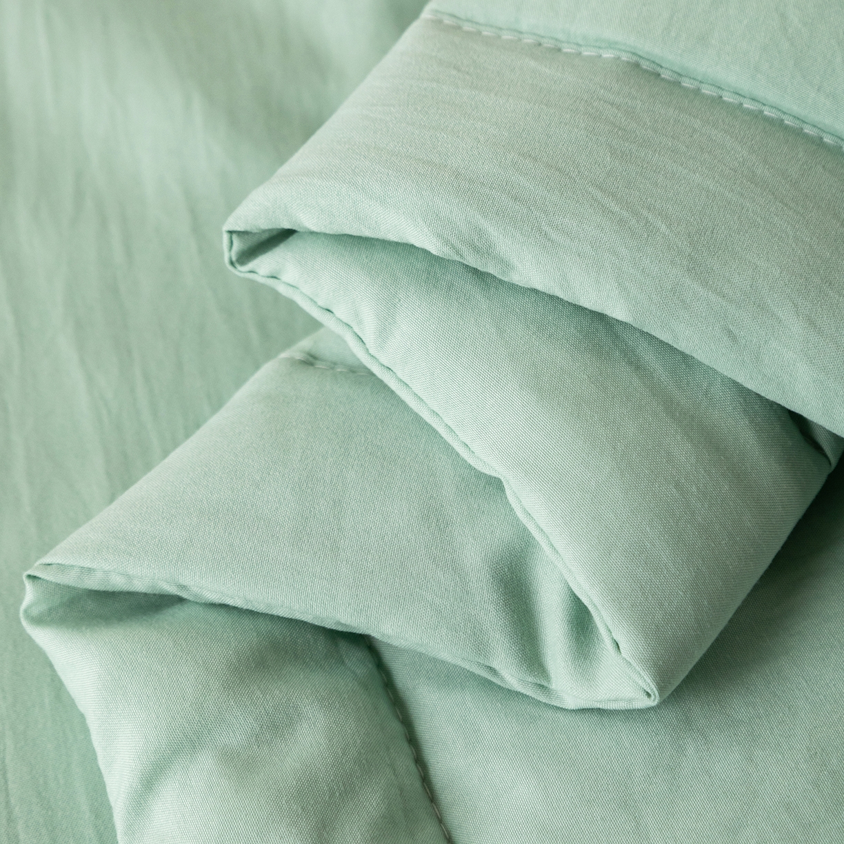 91家纺网 家纺一手货源 找家纺 几禾 2026春夏新款纯色水洗棉双拼夏被新疆棉花被夏凉被空调被被子被芯 纯色-浅绿