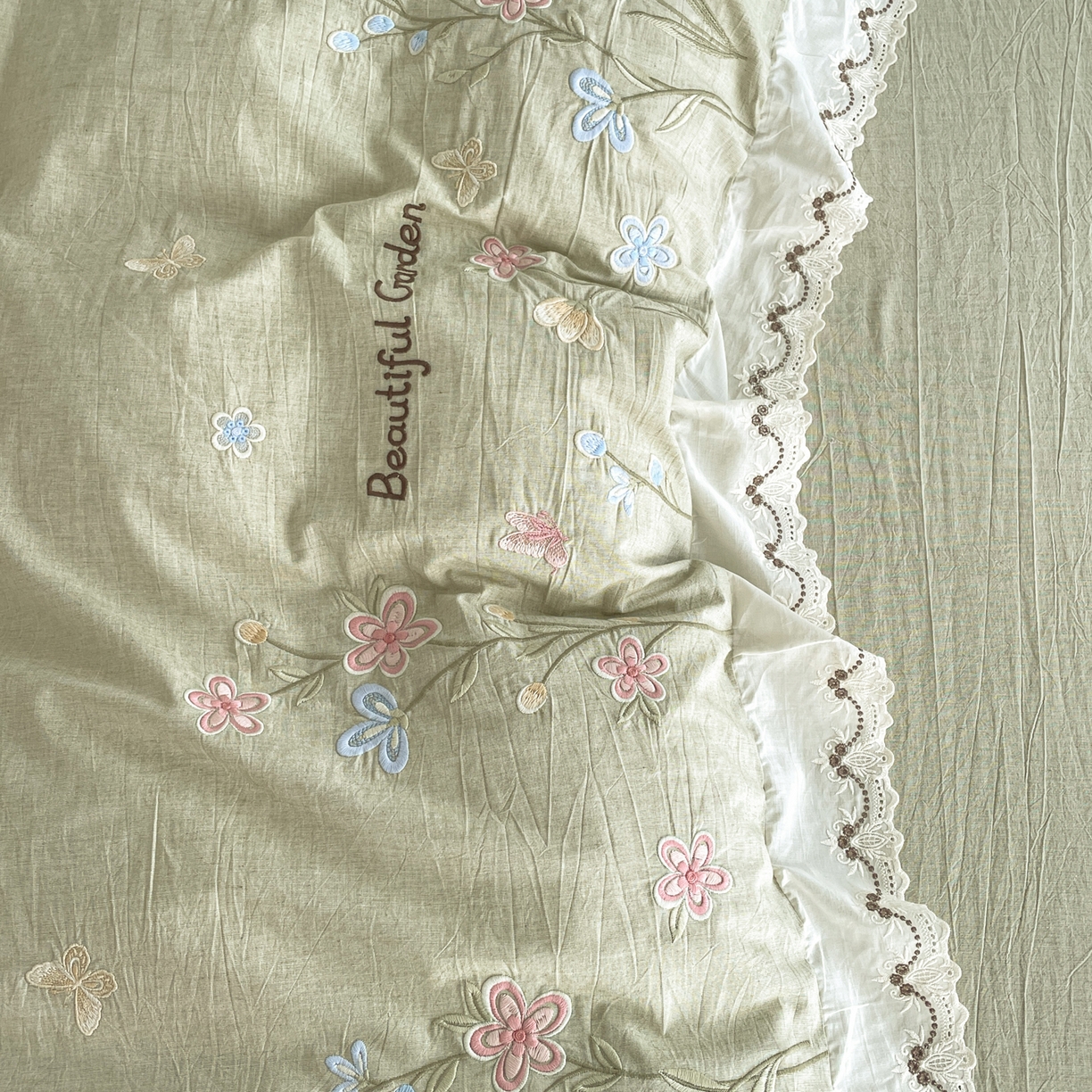 91家纺网 家纺一手货源 找家纺 如一 2026新款棉麻绣花花边款全棉亚麻四件套 花间-绿