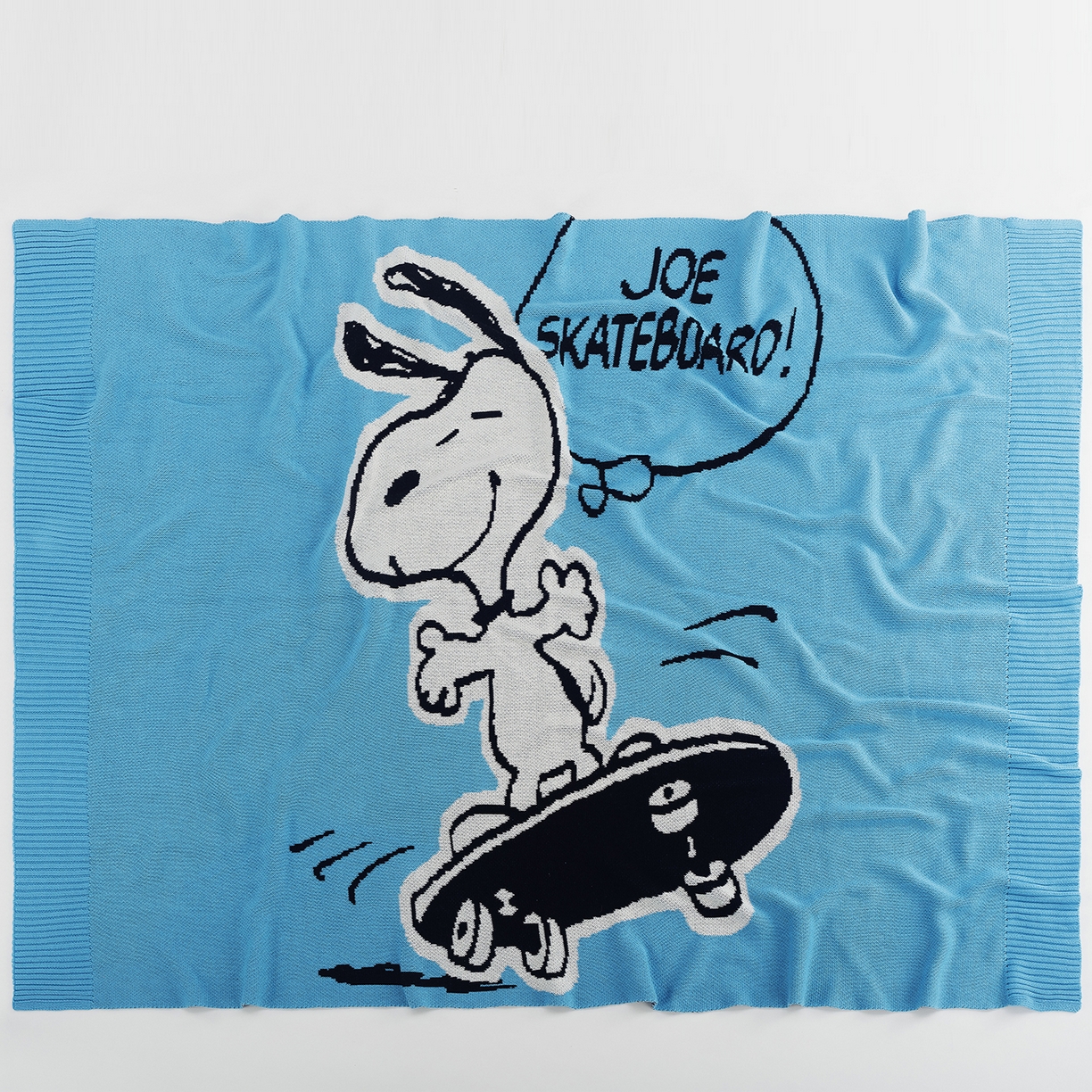 91家纺网 家纺一手货源 找家纺 苏艺针织史努比SNOOPY正版授权独家全棉针织多功能盖毯终端控价 史努比-滑板高手（蓝）