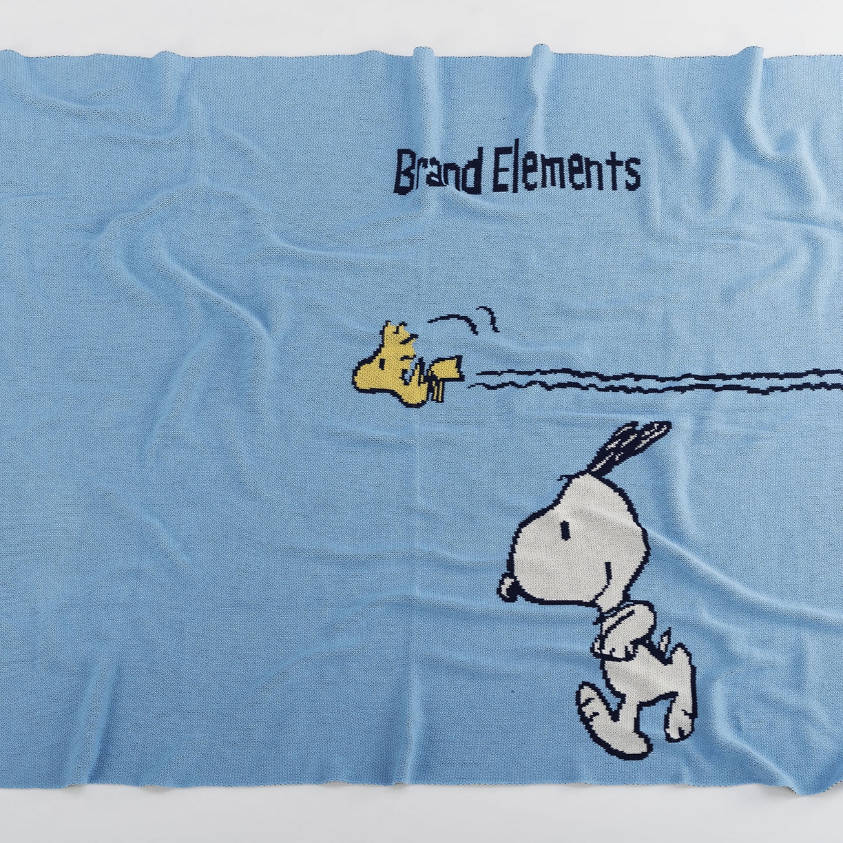 91家纺网 家纺一手货源 找家纺 苏艺针织史努比SNOOPY正版授权独家全棉针织多功能盖毯终端控价 史努比-我心飞翔