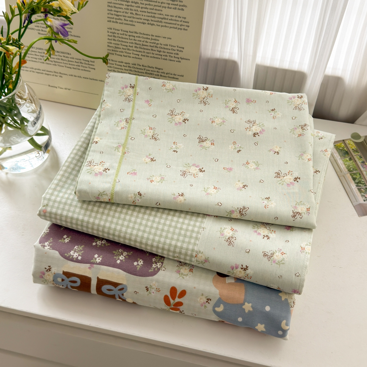 91家纺网 家纺一手货源 找家纺 乐童家纺 2026新款全棉纯棉网红直播爆款吊边＋一字绣工艺款四件套（四） 田园布偶记-绿