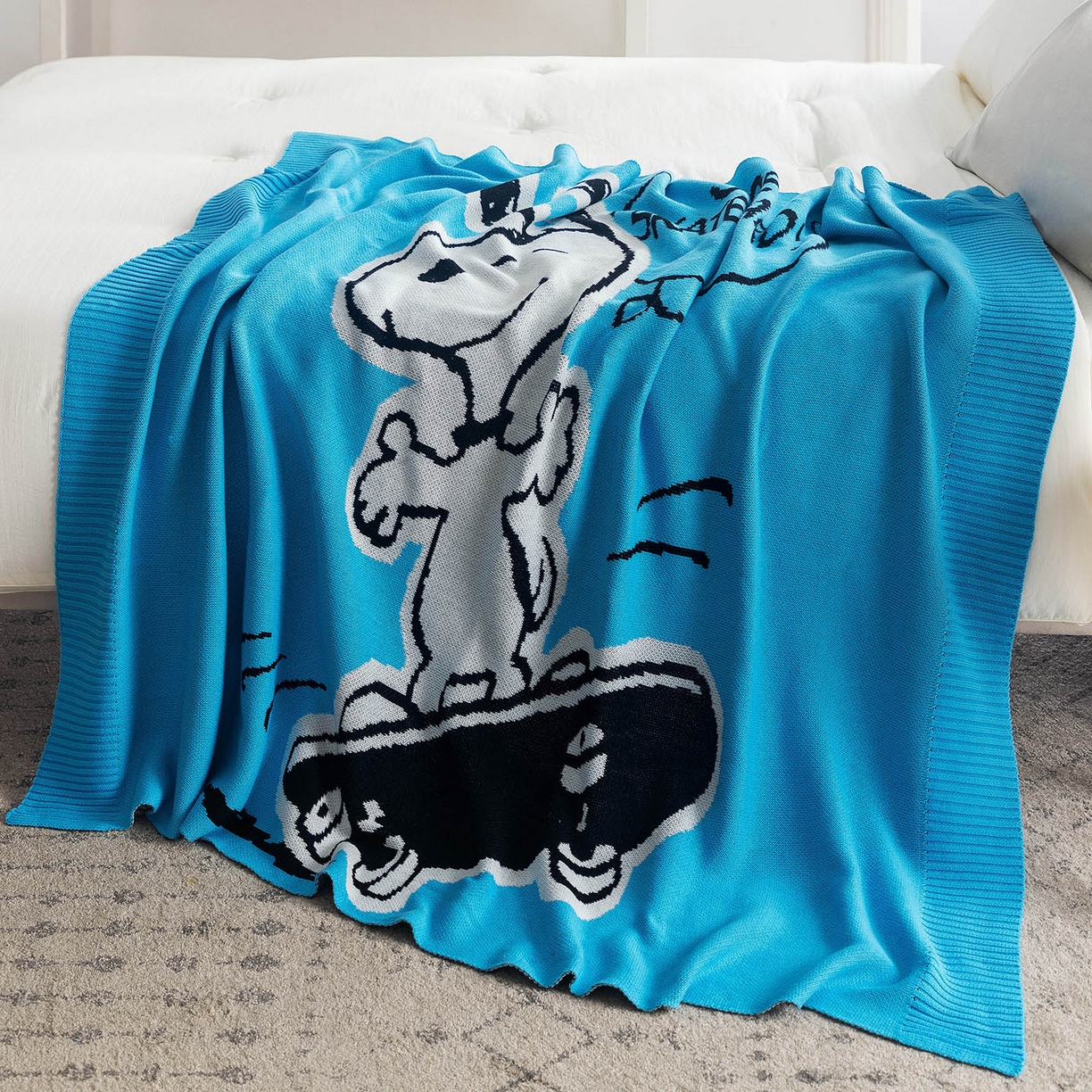 91家纺网 家纺一手货源 找家纺 栩裕纺织 2026新款史努比SNOOPY正版授权独家全棉针织毯多功能针织盖毯 史努比-滑板高手（蓝）