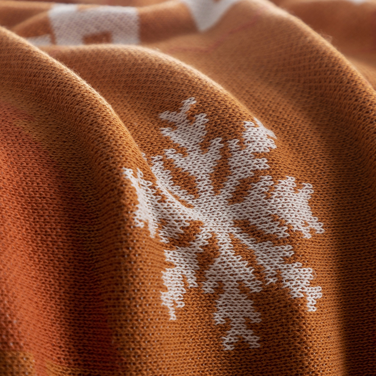 91家纺网 家纺一手货源 找家纺 栩裕纺织 2026新款史努比SNOOPY正版授权独家全棉针织毯多功能针织盖毯 史努比-红棕暖冬