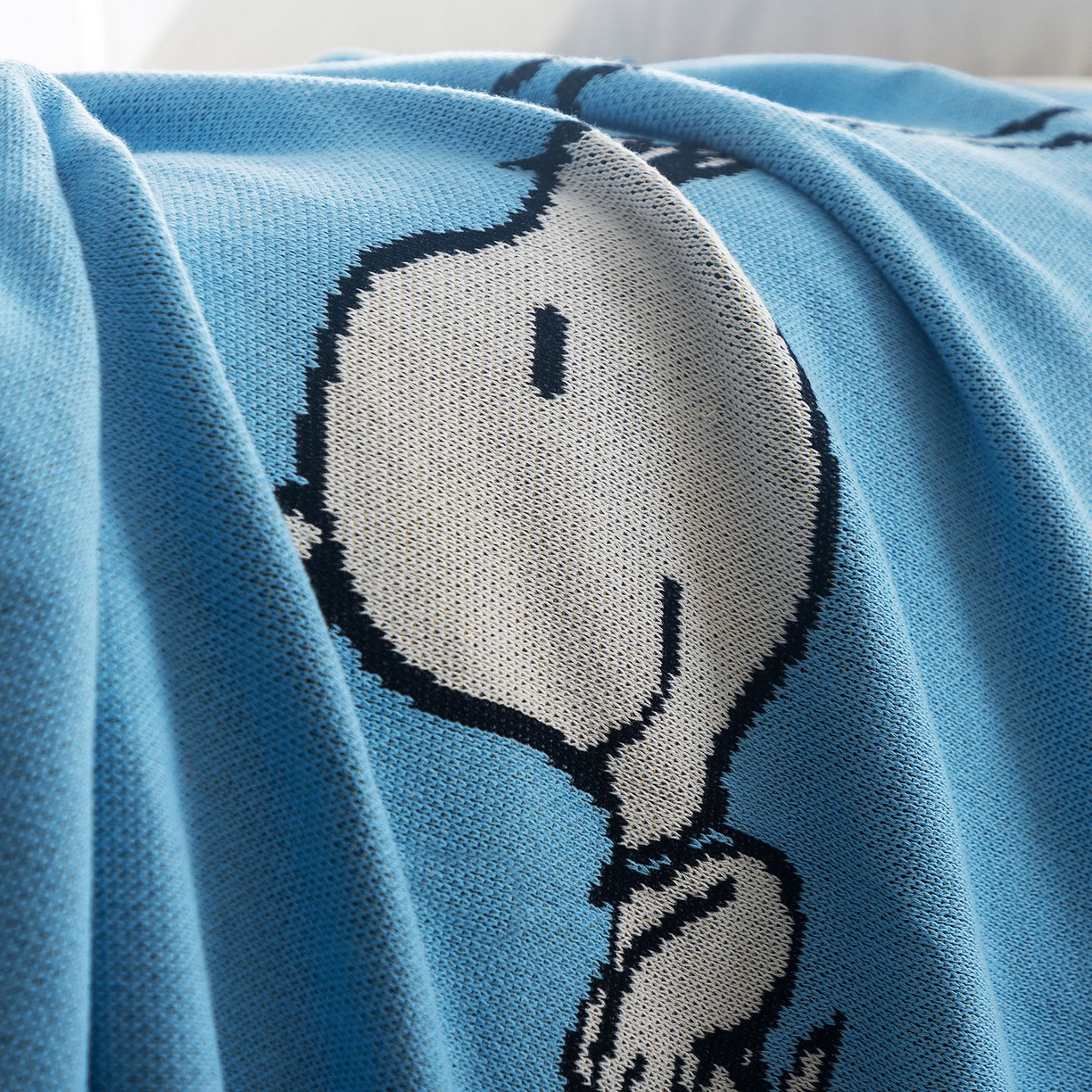 91家纺网 家纺一手货源 找家纺 栩裕纺织 2026新款史努比SNOOPY正版授权独家全棉针织毯多功能针织盖毯 史努比-我心飞翔