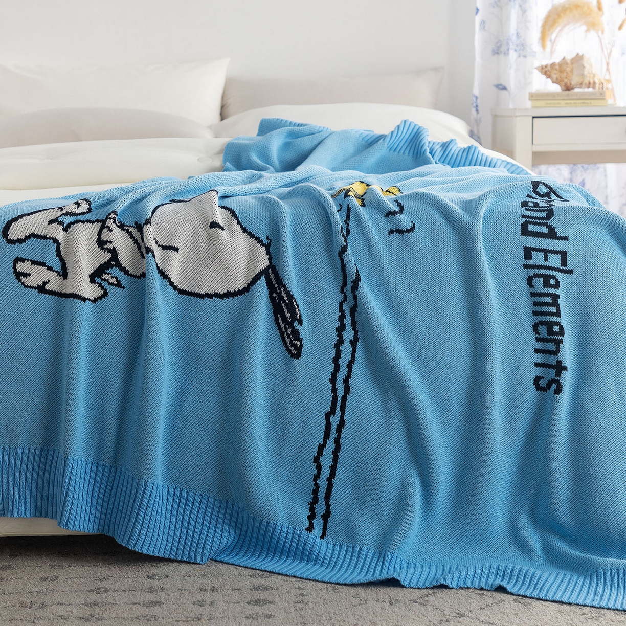 91家纺网 家纺一手货源 找家纺 栩裕纺织 2026新款史努比SNOOPY正版授权独家全棉针织毯多功能针织盖毯 史努比-我心飞翔