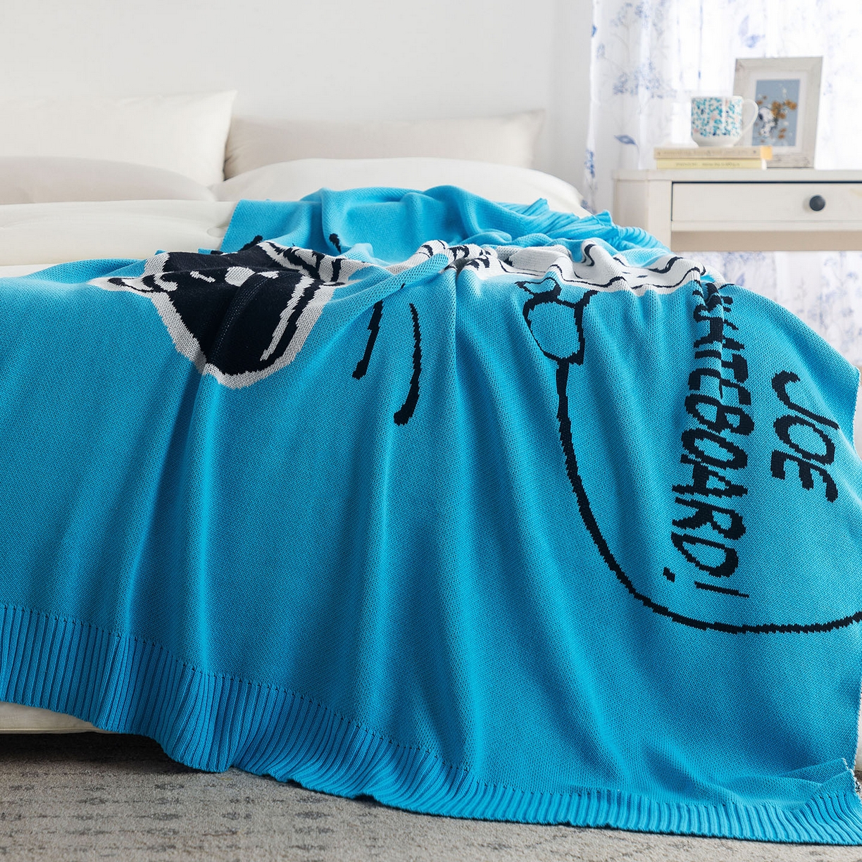 91家纺网 家纺一手货源 找家纺 栩裕纺织 2026新款史努比SNOOPY正版授权独家全棉针织毯多功能针织盖毯 史努比-滑板高手（蓝）